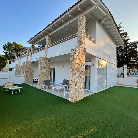 Case Vacanze "Bianco Mare" Porto Pino Bagian luar foto