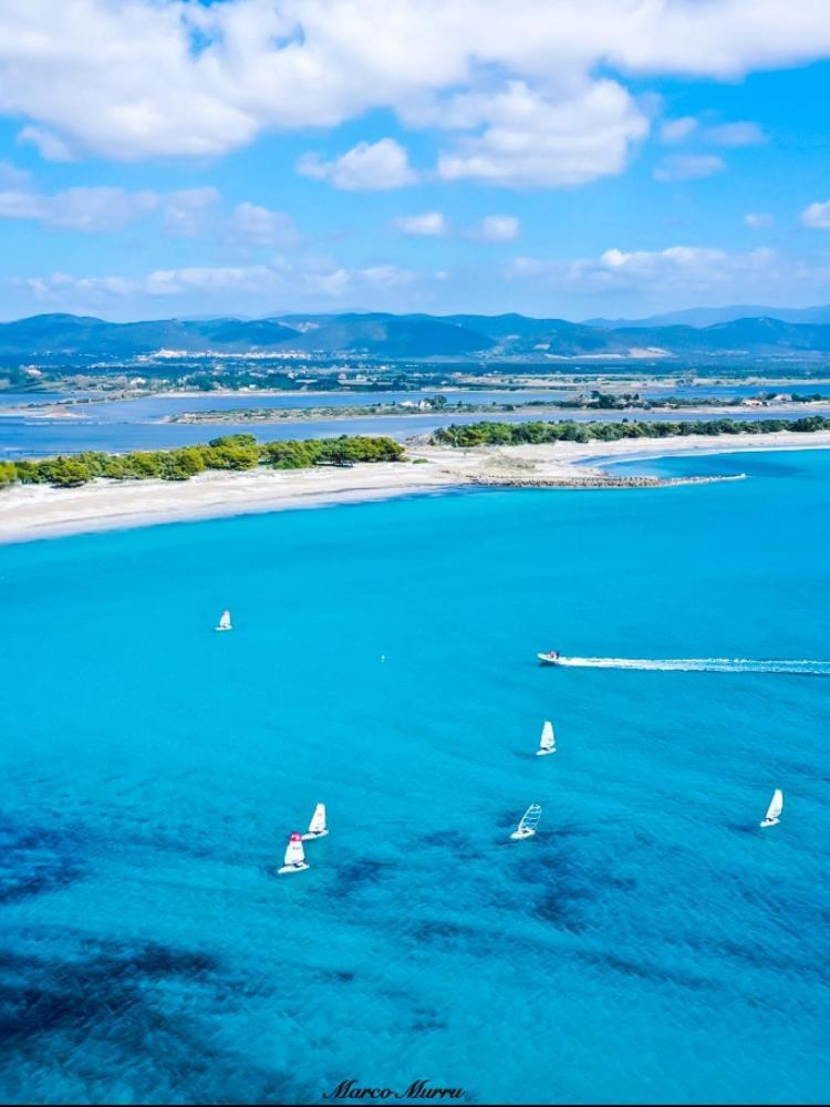 Case Vacanze "Bianco Mare" Porto Pino Bagian luar foto