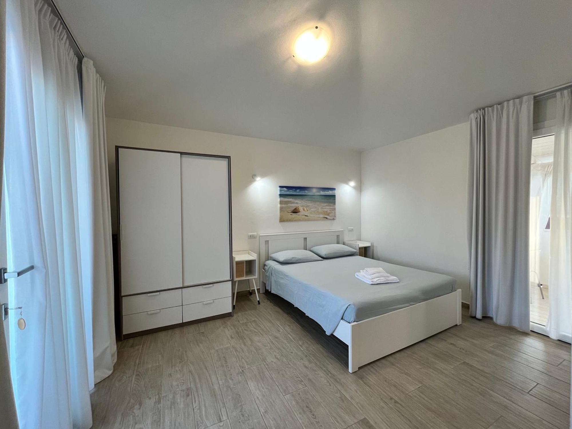 Case Vacanze "Bianco Mare" Porto Pino Bagian luar foto