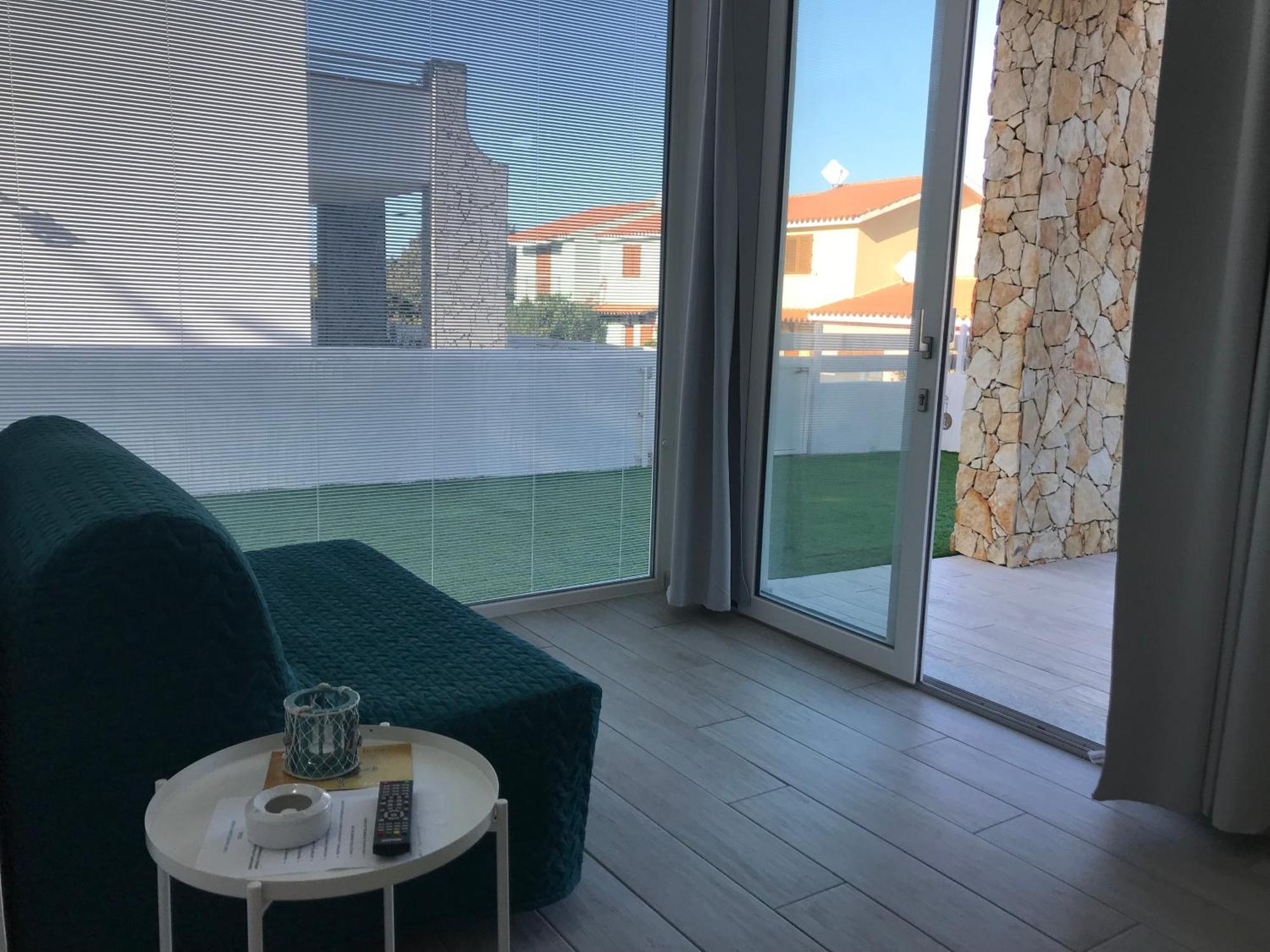 Case Vacanze "Bianco Mare" Porto Pino Ruang foto