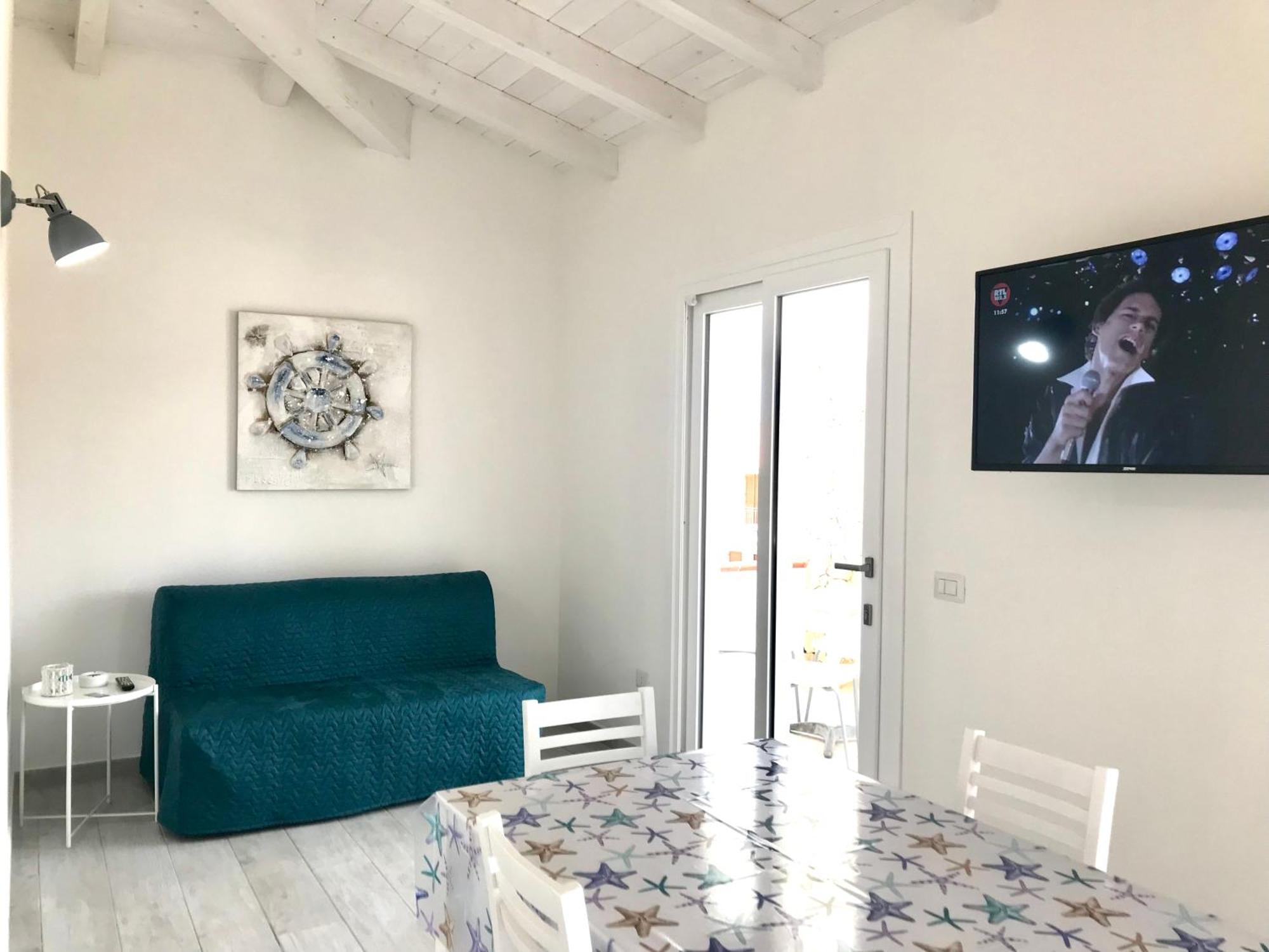 Case Vacanze "Bianco Mare" Porto Pino Ruang foto