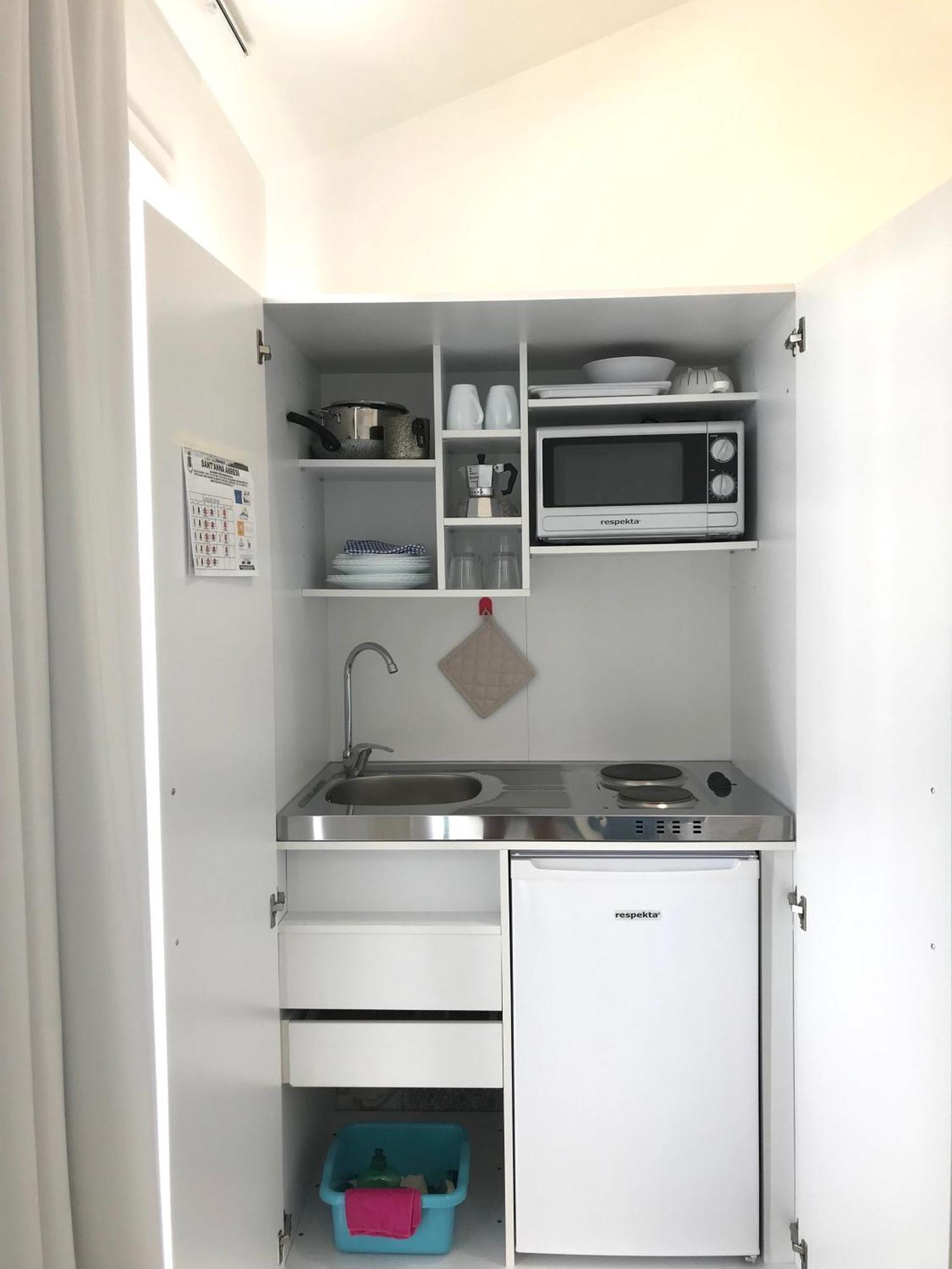 Case Vacanze "Bianco Mare" Porto Pino Ruang foto