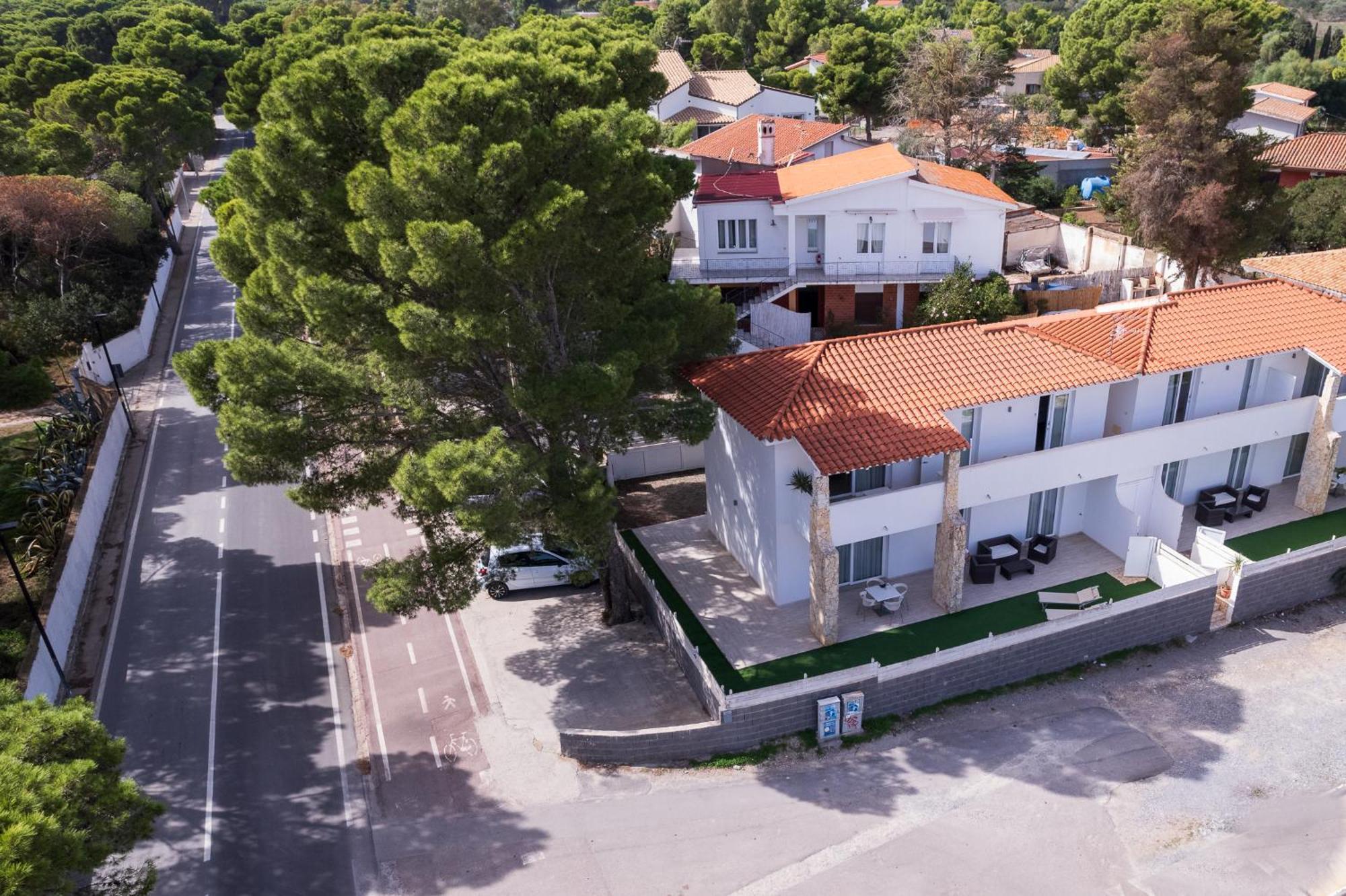 Case Vacanze "Bianco Mare" Porto Pino Bagian luar foto