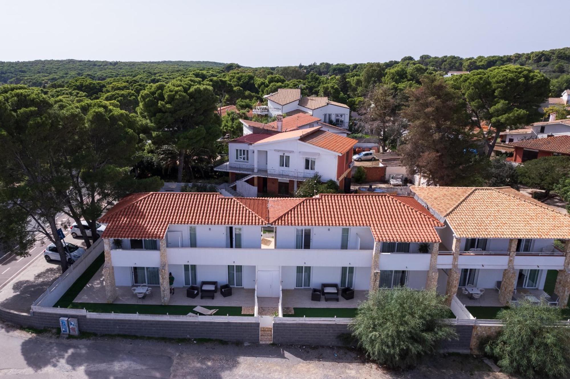 Case Vacanze "Bianco Mare" Porto Pino Bagian luar foto