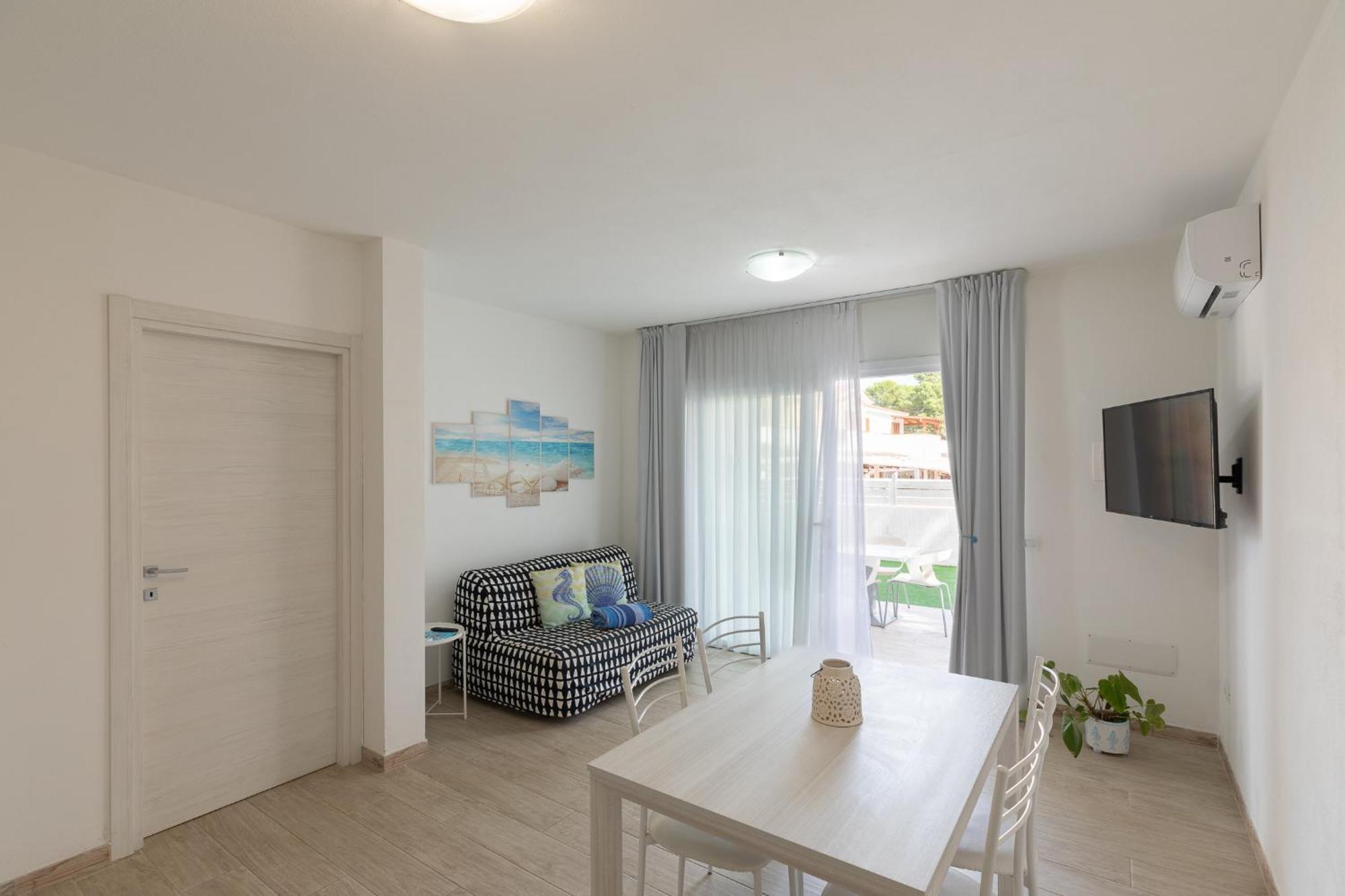 Case Vacanze "Bianco Mare" Porto Pino Bagian luar foto