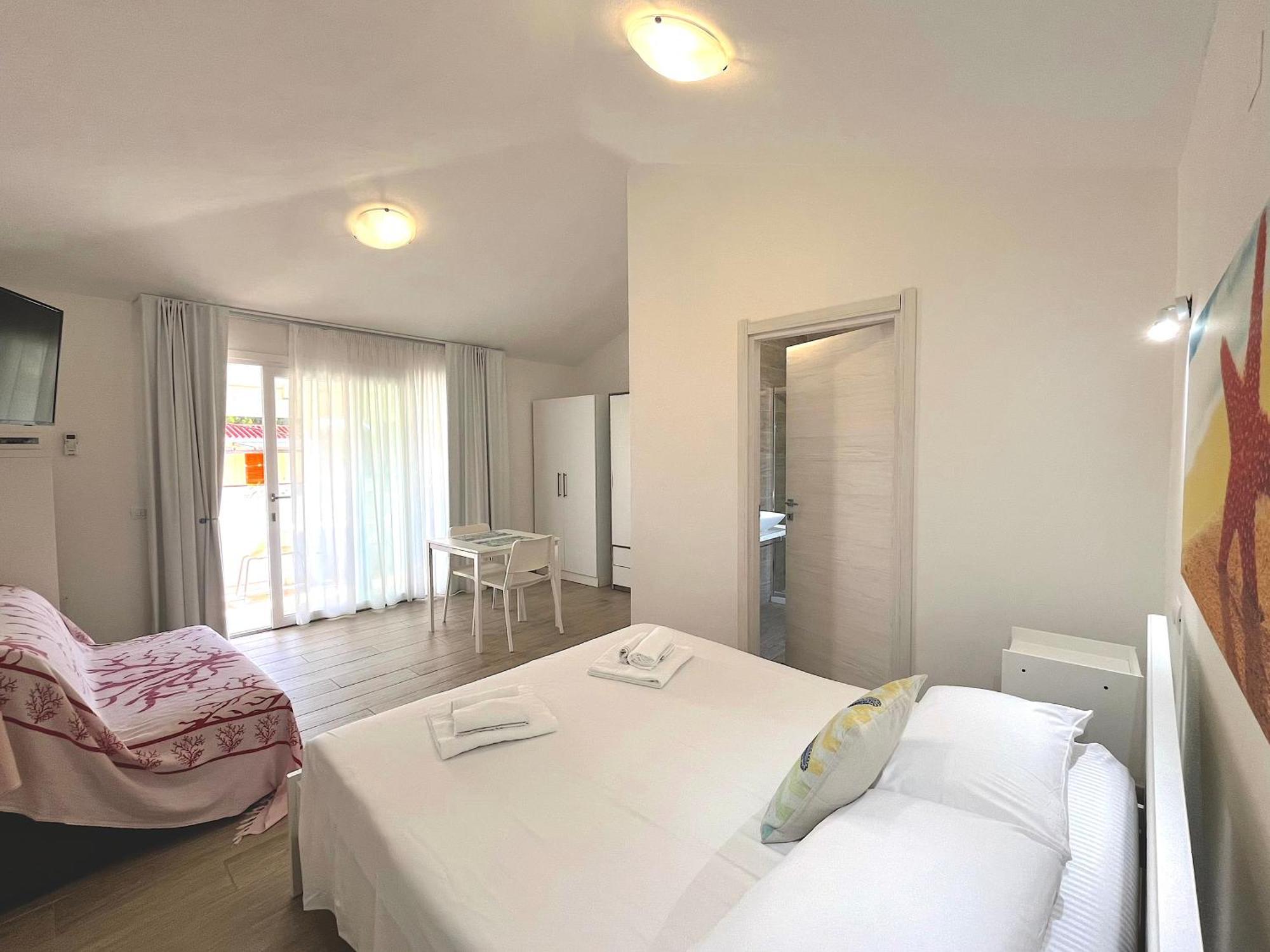 Case Vacanze "Bianco Mare" Porto Pino Ruang foto