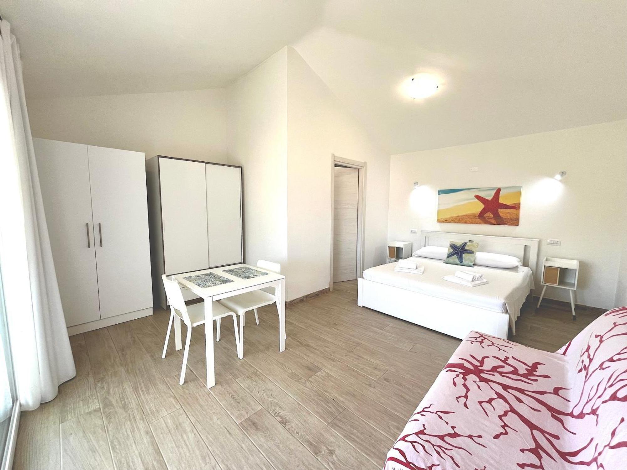 Case Vacanze "Bianco Mare" Porto Pino Bagian luar foto