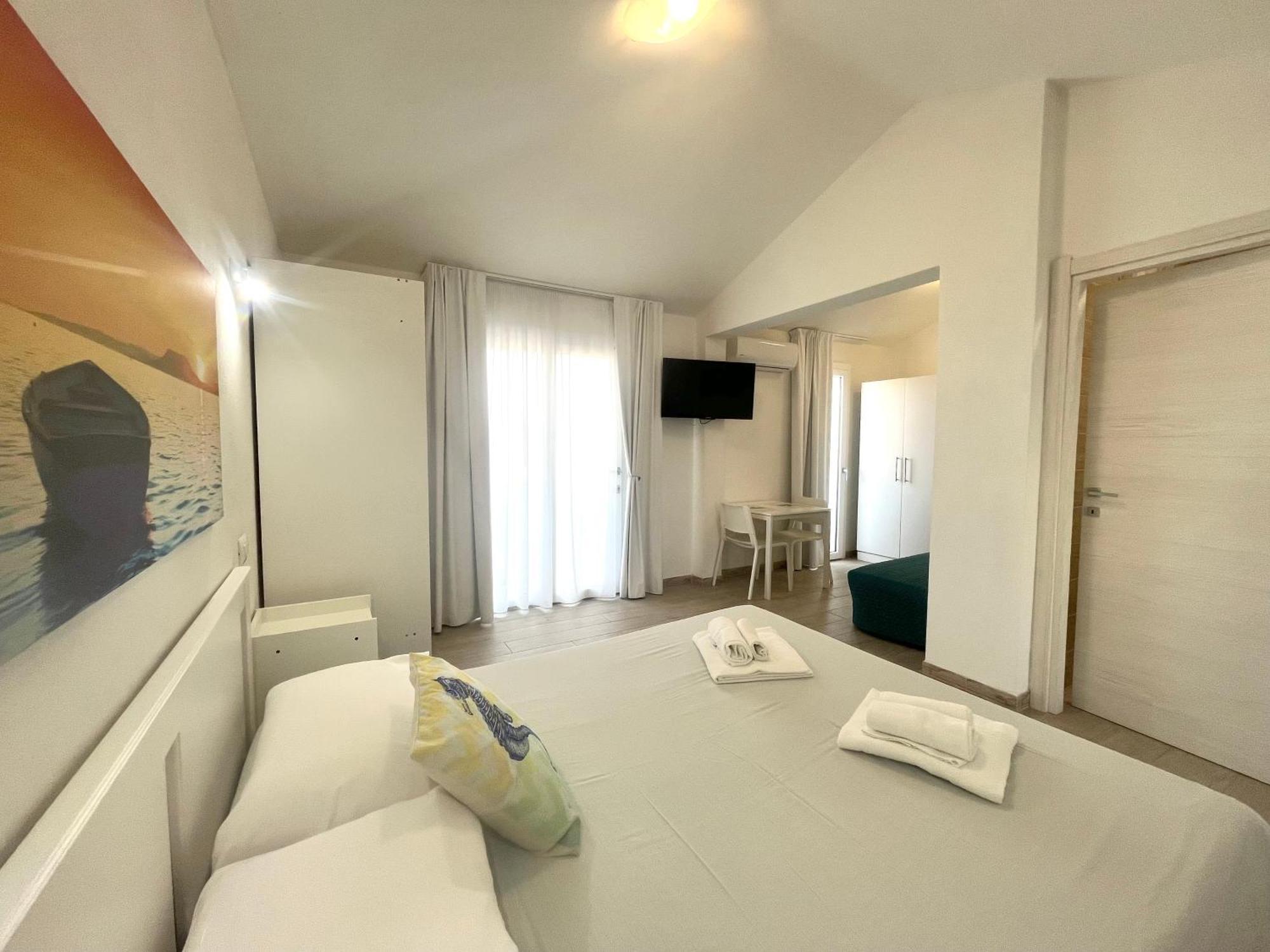 Case Vacanze "Bianco Mare" Porto Pino Ruang foto