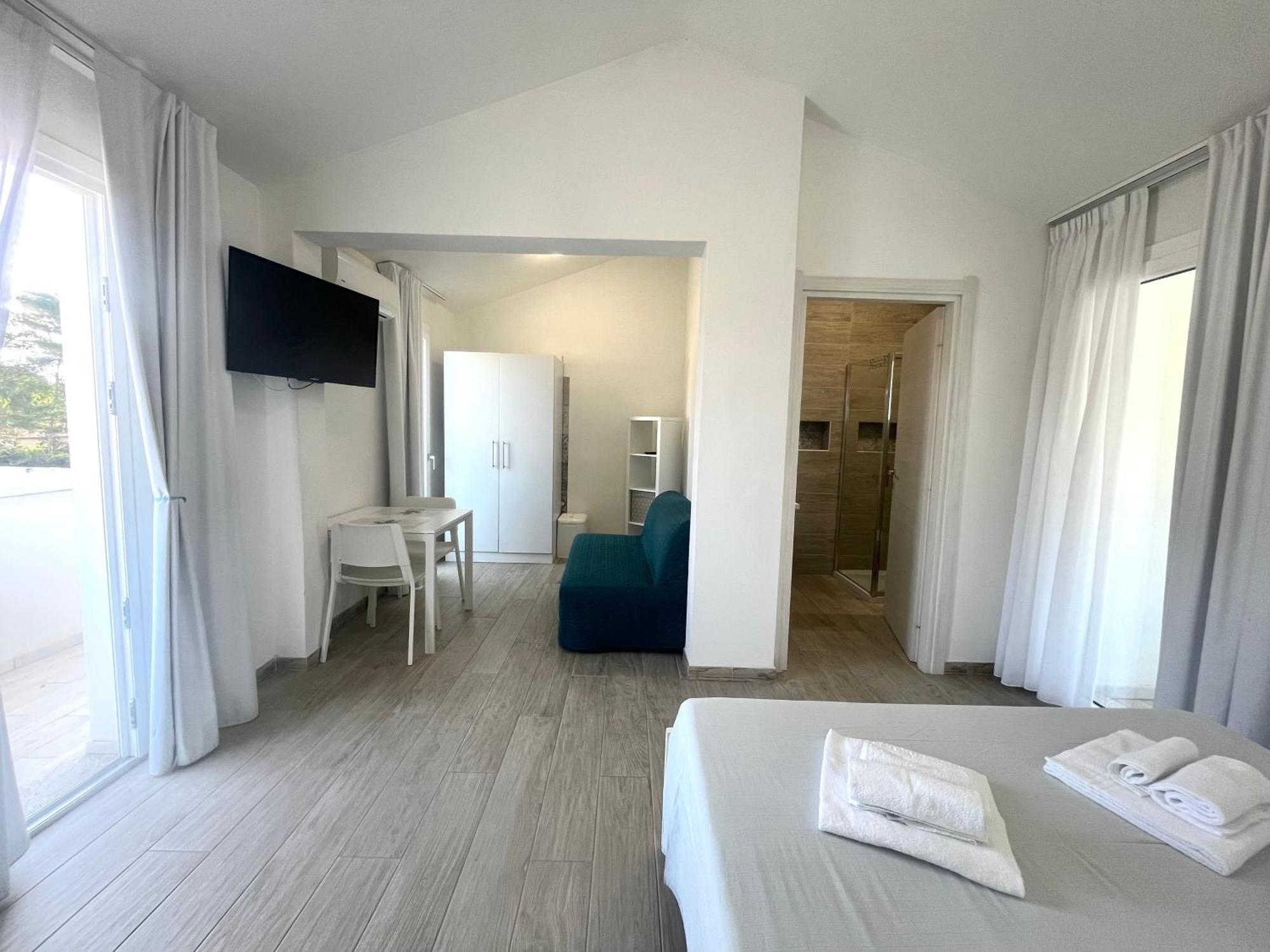Case Vacanze "Bianco Mare" Porto Pino Ruang foto